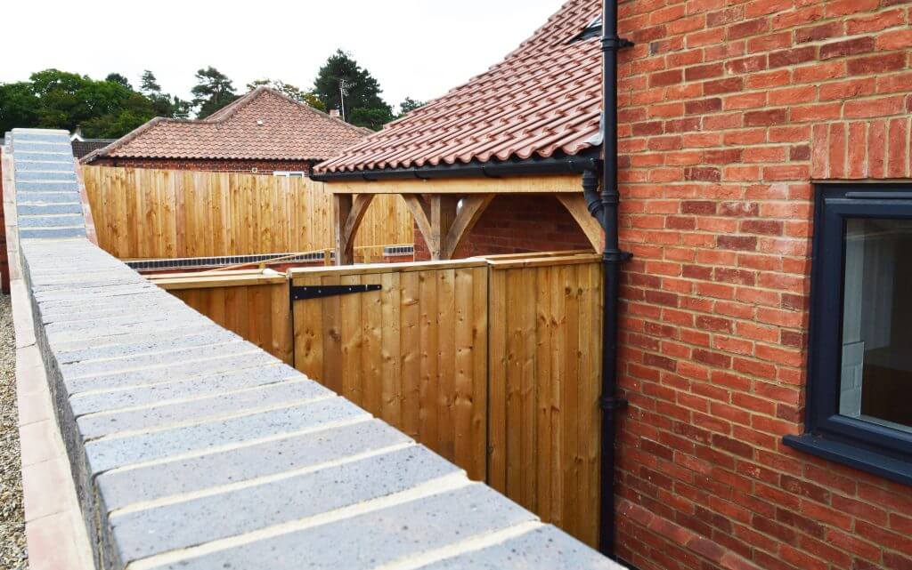 A view of a back gate from a garden